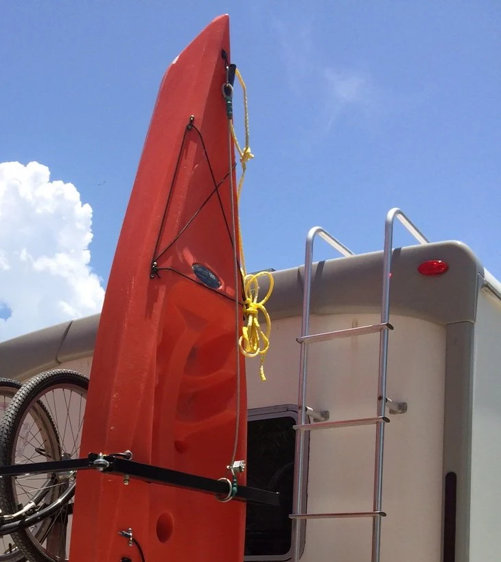 Sale good until 3/18/26 SAVE $300! Yakups®   Model KR2B56 rack can be used with  SWING ARMS on class B  RV's or Truck Campers, Includes Bike Rack, Kayak stainless guards, & Drop down wheel.  SEE VIDEO - Image 8